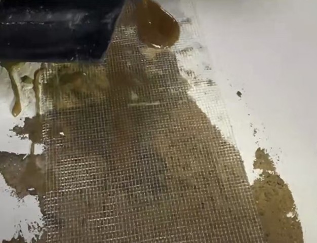 做完面漆后還能看見網格布應該怎么補救？